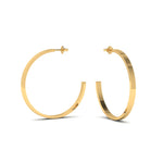 Modernize your look with these classic medium hoop earrings. Crafted from sterling silver with 14k gold vermeil, these timeless hoops are sure to become your go-to for any occasion. Sleek, lightweight, and durable, you're sure to adore these stylish hoops for years to come. It is the perfect piece for curating the ear. Wear with the small hoop or huggie hoop earring to complete the look. 