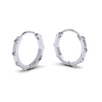  Crafted with beautiful lab-grown diamonds, these earrings add a touch of sophistication to any outfit. Get the luxurious sparkle of diamonds without the ethical and environmental concerns that come with mined diamonds. It is the perfect pair for curating the ear. Wear with the small hoops and huggie hoops to complete the look. 