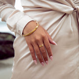 Crafted from sterling silver with 14K gold vermeil, this bangle from our Cyclical Collection is an elegant and timeless piece of jewelry. Wear it alone or pair it with our Cyclical Thick or Thin Ring for a luxurious, coordinated look. Perfect for any occasion, it is a great addition to your jewelry collection.